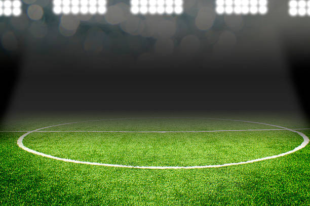 istock Soccer ball on field in stadium 471681244