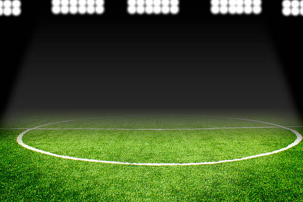 istock Soccer ball on field in stadium 471681306