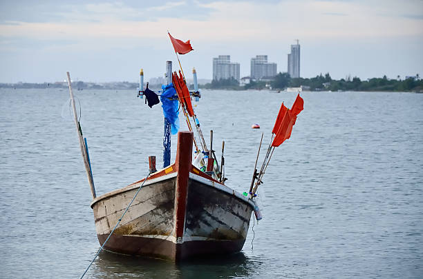 istock Fishing boat floating in a sea 471682232