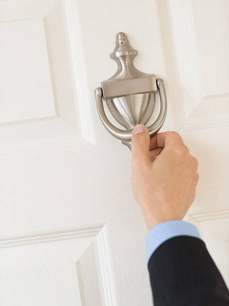 istock Businessman'S Hand Knocking Door Handle 471686275