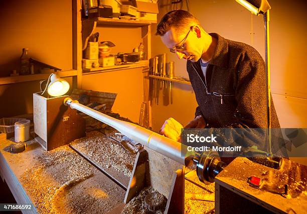 Joiner Working On Lathe Stock Photo - Download Image Now - 2015, 30-39 Years, Activity