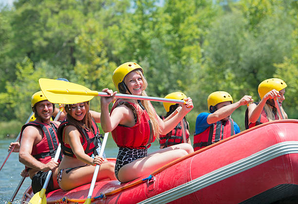 istock Group of people rafting on the river 471686664