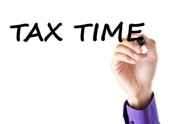 istock Closeup of hand with tax time 471686754