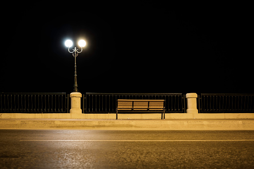 promenade bench at night