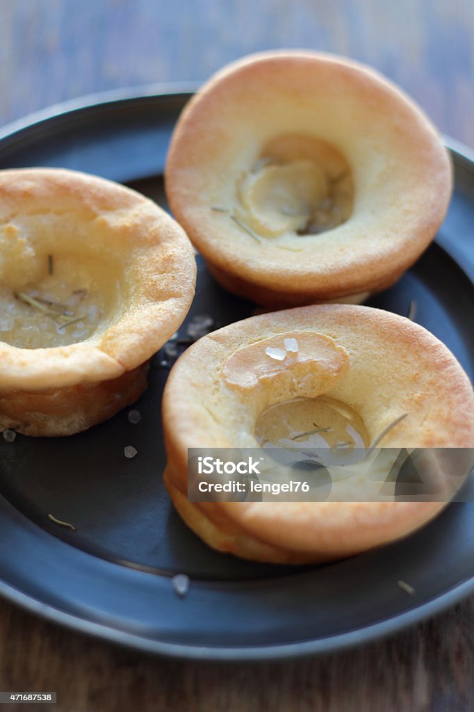 Yorkshire pudding. Yorkshire pudding sprinkled with sea salt and rosemary. 2015 Stock Photo