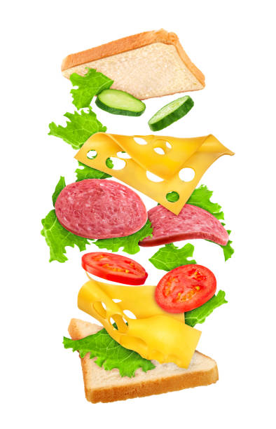 istock sandwich with reflection and falling ingredients on a white background 471687578