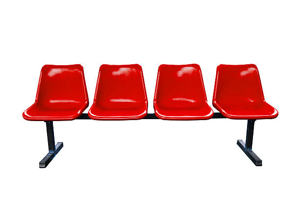 istock Red plastic chairs at the bus stop isolated 471687827