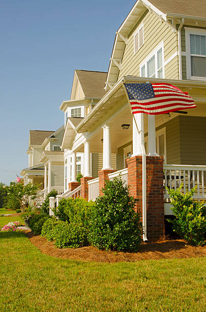 istock House with an American Flag 471688005