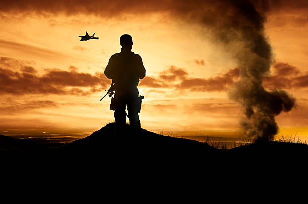 istock Soldier Watches Air Strike 471688035