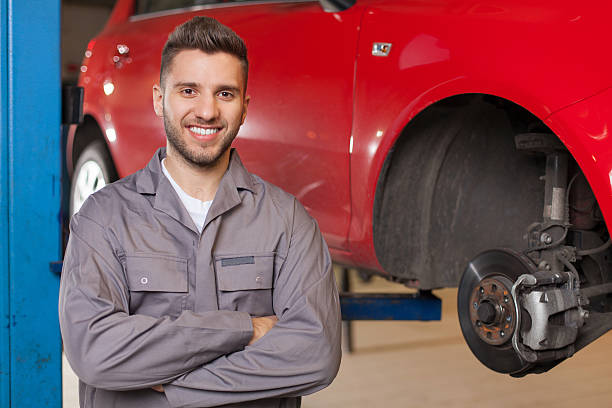 istock Auto Mechanic Waiting with Arms Crossed 471688554