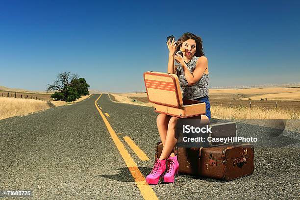 Sexy Brunette Hitch Hiker Stock Photo - Download Image Now - One Woman Only, Sensuality, Sex Symbol