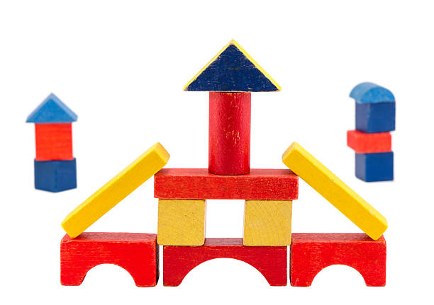 istock colorful wood toy brick construction on white 471689099