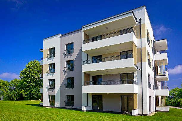 istock Modern apartment house in the park 471689723