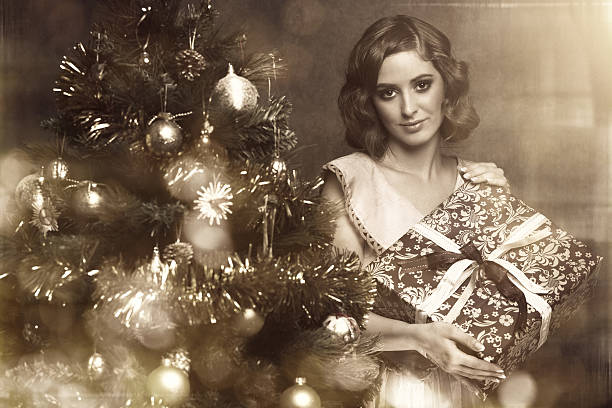 istock retro girl holding christmas gift 471690707