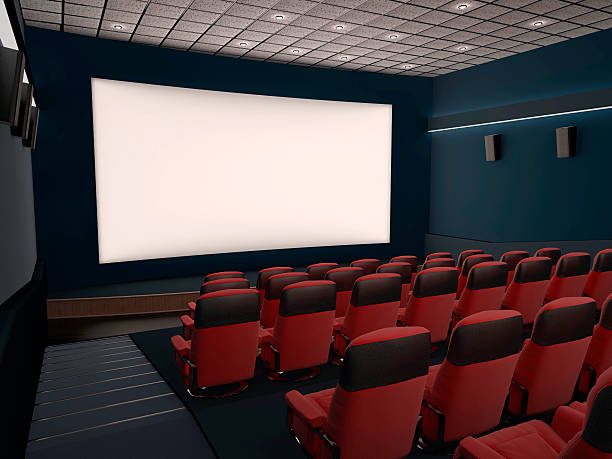 istock Cinema seats with projector lights 471691700