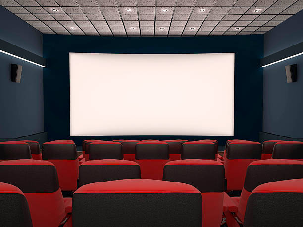 istock Cinema seats with projector lights 471691704