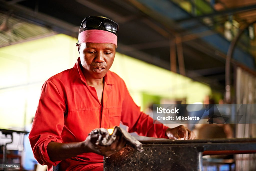 Perfecting his glasswork techniques Shot of a glassblower at work in a glassmaking factoryhttp://195.154.178.81/DATA/i_collage/pu/shoots/795699.jpg 2015 Stock Photo