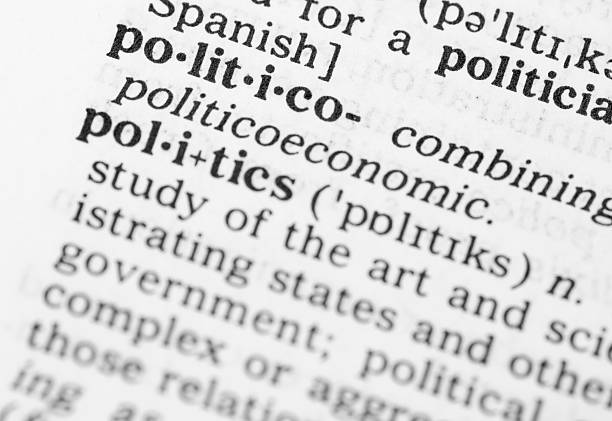 istock Macro image dictionary definition of politics 471694327