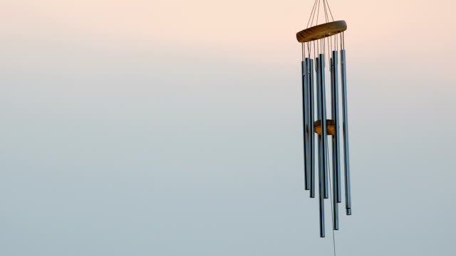 wind chime tube mobile in breeze.