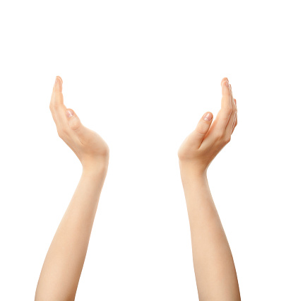 female hands holding up something on white