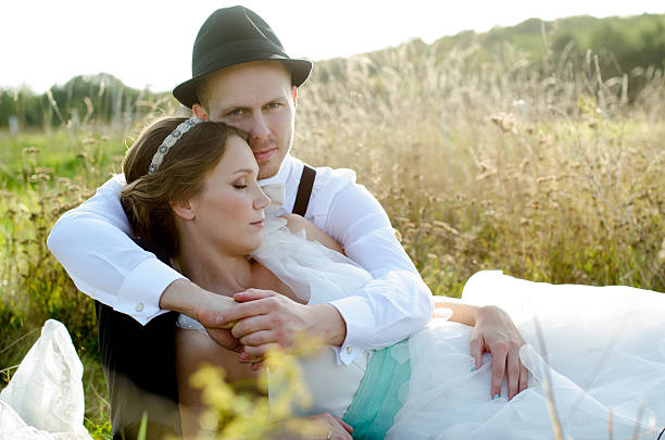 istock Bride and groom posing outdoor 471695339