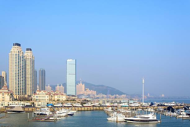 Building and boat at seashore in Dalian city, China
