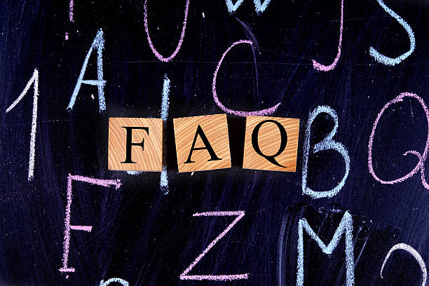 istock FAQ on the drawing board. Wooden cubes. 471696674