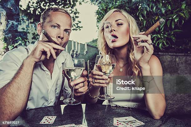 Couple Having A Drink And Smoking Cigar Stock Photo - Download Image Now - Cigar, Smoking - Activity, Smoking Issues