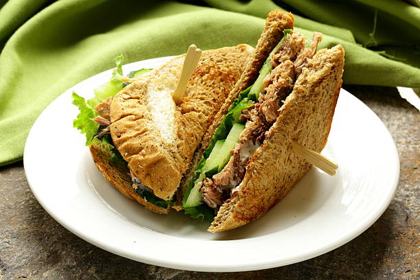 istock Tuna sandwich with cucumber and lettuce 471697137