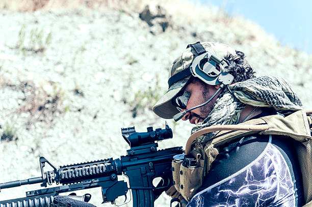 istock Hispanic Modern Army Soldier Loading Grenade on Assault Rifle 471698107