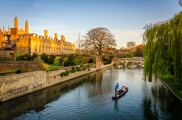 Evening punting on the River Cam in Cambridge Cambridge, UK - April 21, 2015: Evening punting on the River Cam in Cambridge cambridge england photos stock pictures, royalty-free photos & images