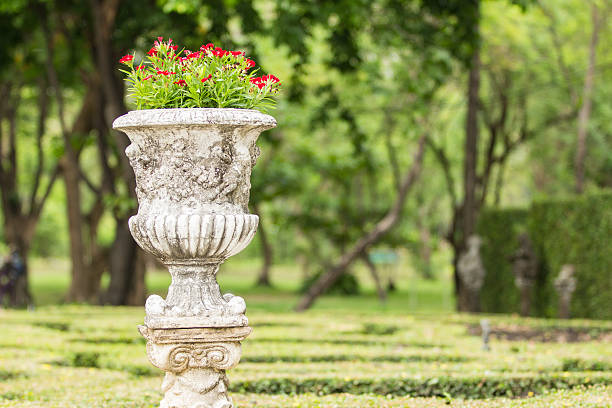 istock Flower pot in green garden 471700155