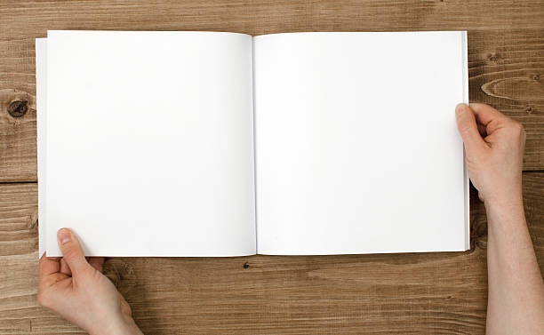 istock Opening a blank magazine on a wooden background 471701506