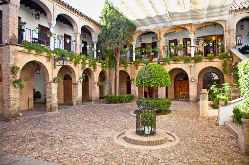 Typical andalusian mudejar courtyard In Seville, Spain.
