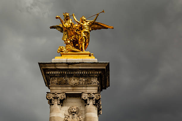 istock Alexandre III Bridge Pillar Close Up against Clouds, Paris 471702985