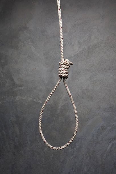 istock Hands holding rope slipknot in concept suicide 471703226