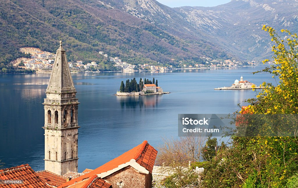 Perast, Bay of Kotor, Montenegro Summer view of Perast and islets of St. George and Our Lady of the Rocks in Bay of Kotor, Montenegro 2015 Stock Photo