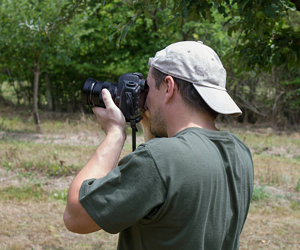 istock photographer taking photo 471705463