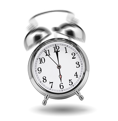 ringing classical alarm clock isolated on white background