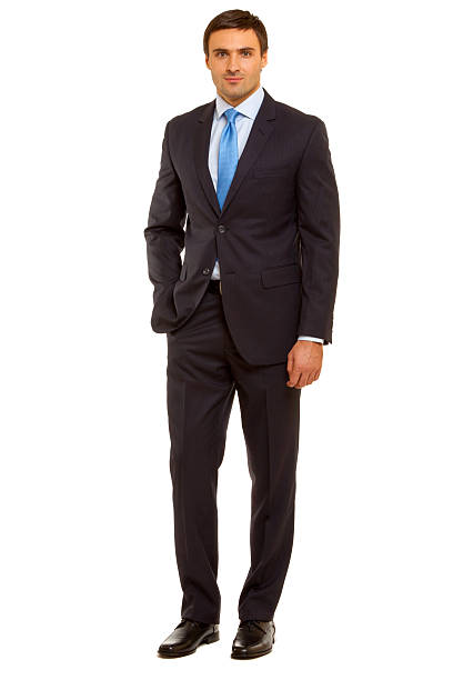 istock Well-dressed man. Charismatic businessman standing on white background 471707820