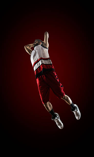 istock Basketball player in action is flying high 471708088