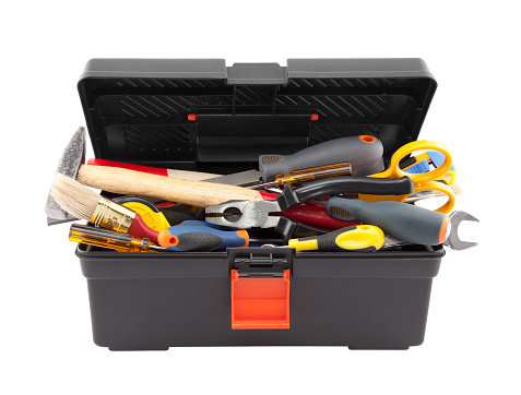 Open black toolbox with tools. Clipping path included.