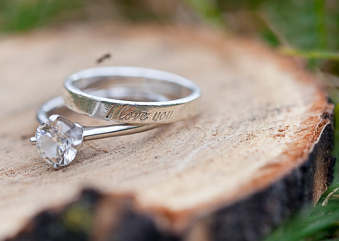 Engagement and a promise ring with inscription 