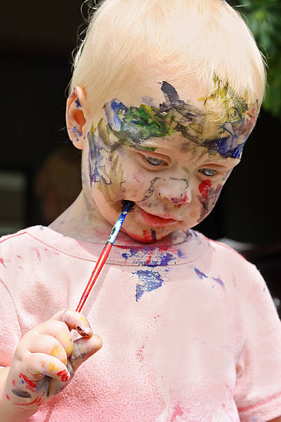 istock Baby Painting His Face 471709327