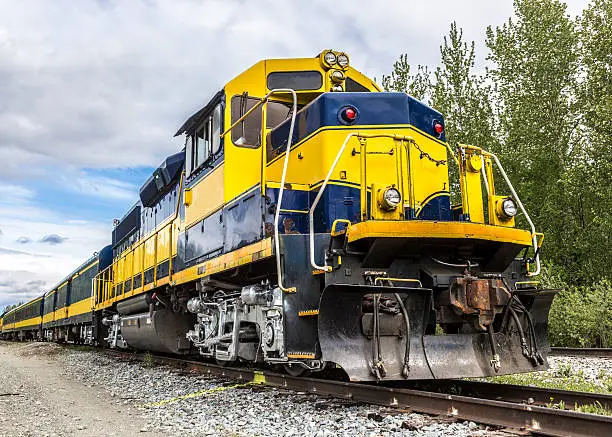 A sightseeing passenger train in Alaska traveling from Anchorage to Denali National Park.