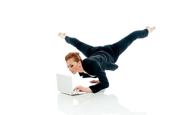 istock Concept of busyness - entrepreneur posing with PC 471710135