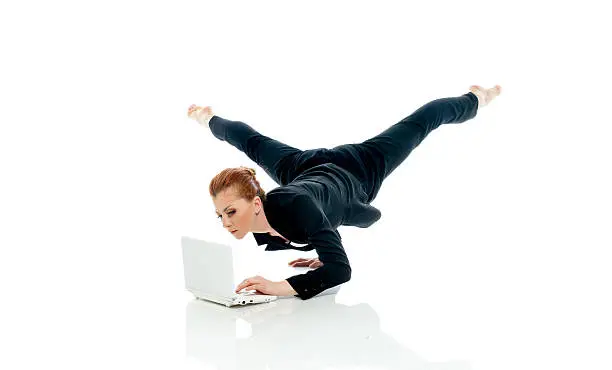 Photo of Concept of busyness - entrepreneur posing with PC