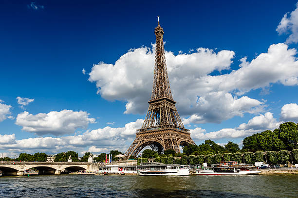 istock Eiffel Tower and Seine River with White Clouds in Background 471711033