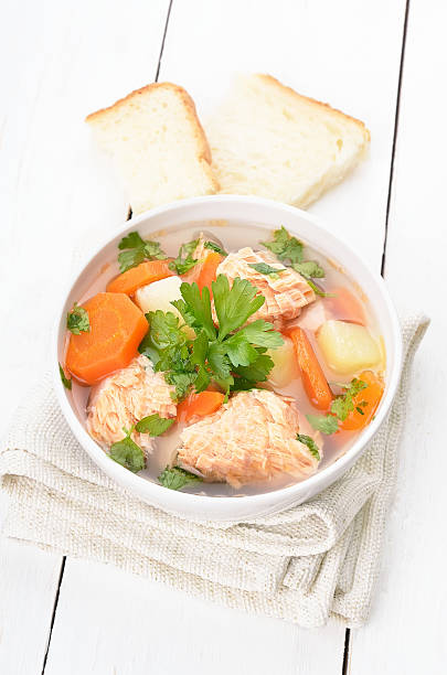 istock Fish soup on white wooden table 471711336