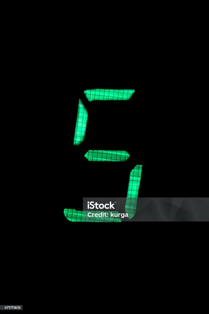 digital number five in green on black background Abundance Stock Photo